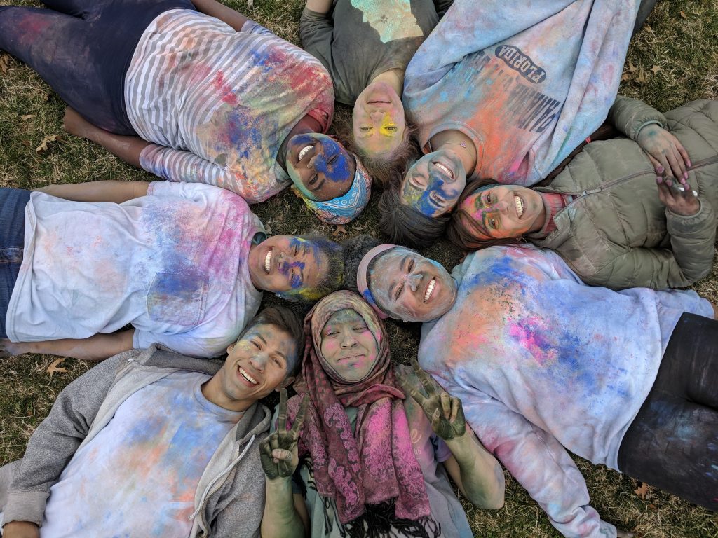 Leandro with friends celebrating the traditional Indian festival of colors in Missouri.